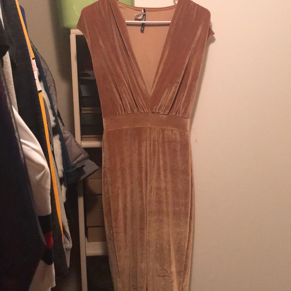 Gold one piece body suit
